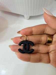 Chanel CC Logo Pendant/Charm check details