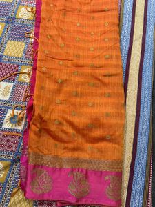 Orange Saree with Golden Motifs