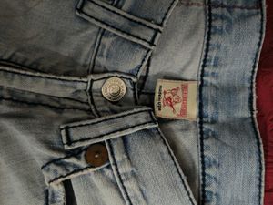 Light Wash Distressed Denim Jeans
