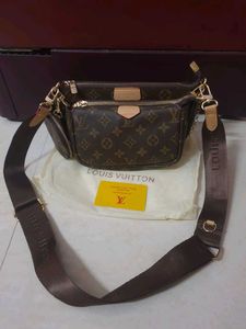 Louis Vuitton pochette With Pink Belt