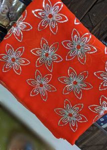 Vibrant Orange Embroidered Saree with blouse seque