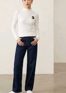 White Ribbed Mock Neck Sweater with Flower Detail