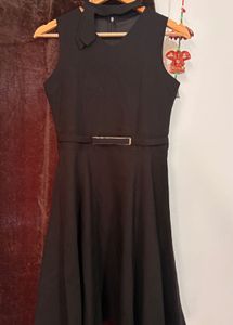 Classic Black Sleeveless Dress with Belt