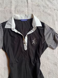 Classic Black Polo Shirt with Striped Sleeves