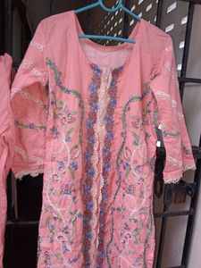 Elegant Pink Kurta Set with Intricate Embroidery