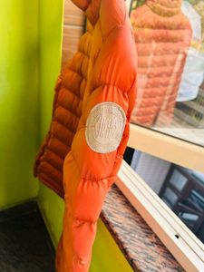Orange puffer packable jacket