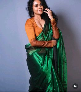 Elegant Emerald Green raga tissue Saree