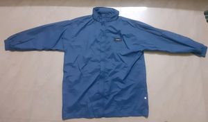 Original blue rain coat with foldable cap.The opening zib is in front.Full sleeve.XXL size.Not used