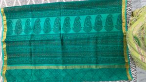 Elegant Teal  kota doria Saree with Gold Border