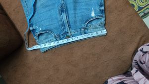 Light Wash Distressed Denim Jeans