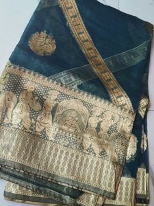 Elegant Teal Saree with Gold Border