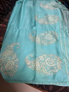 Elegant Teal Saree with Intricate Design