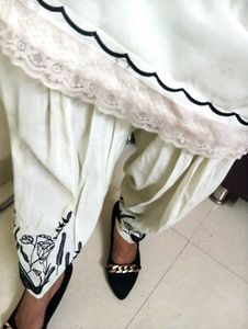 Elegant Cream Kurta Set with Black Embroidery