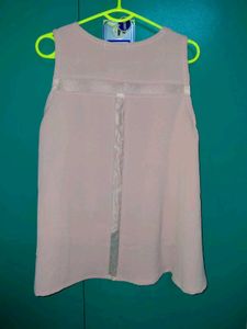 Stylish Pink Sleeveless Top with Eyelet Detail