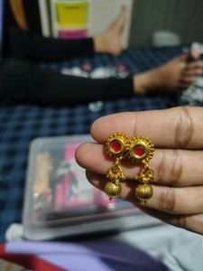 Gold Tone Dangle Earrings with Red Stone