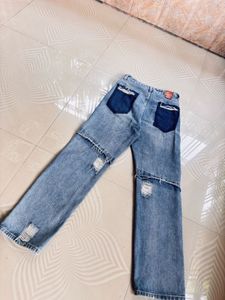 Ripped Light Wash Denim Jeans