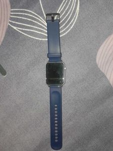 Blue Smartwatch with charger