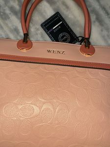 Chic Pink Embossed Handbag