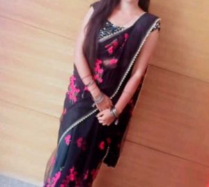 Elegant Black Saree with Pink Floral Print
