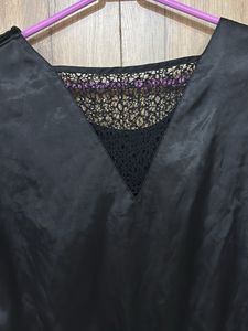 Chic Black Satin Romper with Lace Detail