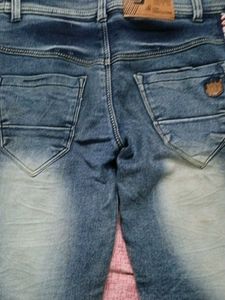 Distressed Blue Jeans with Side Stripe
