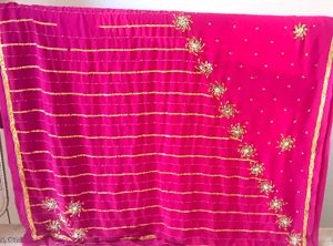 Elegant Pink Saree with Gold Embellishments