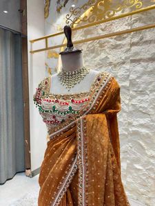 Elegant Brown Embellished Saree