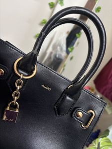 Chic Black Aldo Handbag with Lock Detail