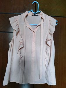 Chic Pink Ruffled Sleeveless Blouse