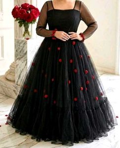 Elegant Black Gown with Red Floral Accents