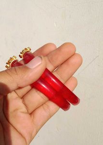 Elegant Red Bangles with Gold Accent