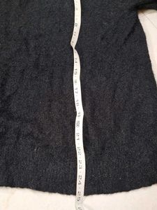 Black shiny woolen top
