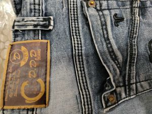 Distressed Blue Denim Jeans