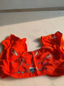 Red Orange Saree With Blue Flower Embroidery