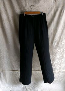 women pleated black trousers