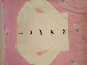 Cream Ribbed Top with Black Bows