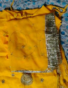 Embroidered Yellow Rajasthani poshak.