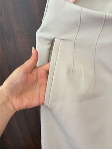 High-Waisted Beige Trousers