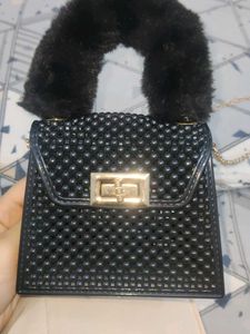 Chic Mini Black Handbag with Fur Accent