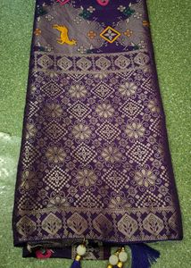 Elegant Purple Silk Saree with Intricate Gold Weav