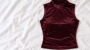 velvet maroon top paired with long black skirt wit