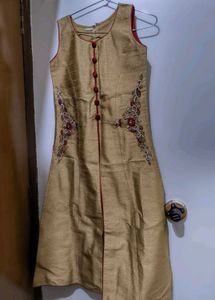 Elegant Gold Kurta with Red Accents