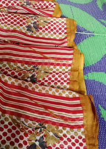 "Crimson Blooms: A Red Floral Print Saree 🌹🌼💃"
