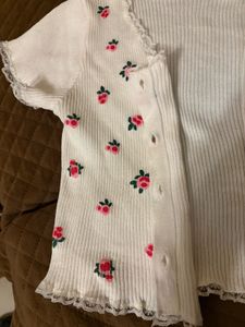 Coquette white rib-knit floral baby tee
