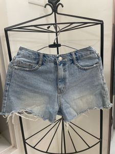 Distressed Light Wash Denim Shorts