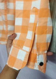 checkers orange shirt