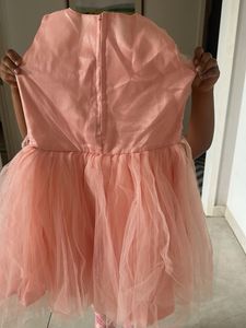 Girls Peach-Pink Ruffle Party Gown