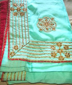 Stunning Teal Saree with Gold Embellishments