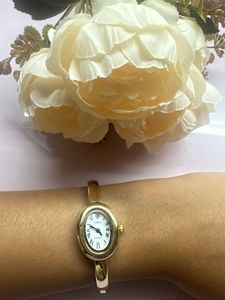 Elegant Gold Oval Bangle Watch