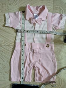BKIDS small size boy's dress look like romper in pink and white color combination.